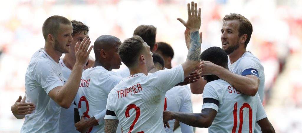 Kane strikes as Kompany limps off